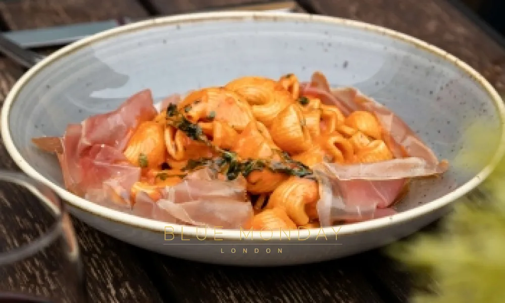 a plate of Italian cuisine on a table in a restaurant
