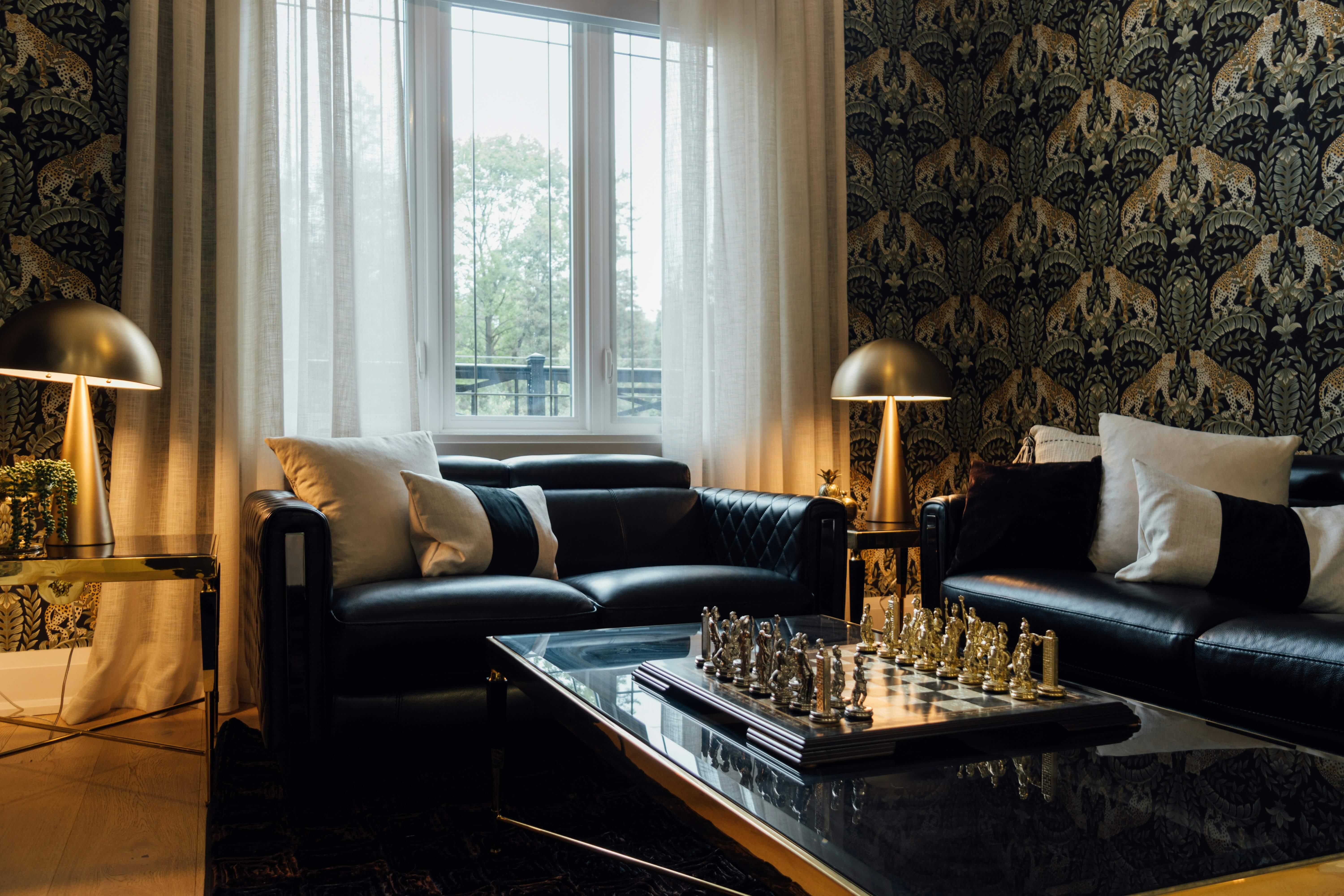 a luxury hotel suite in London that is ornately decorated