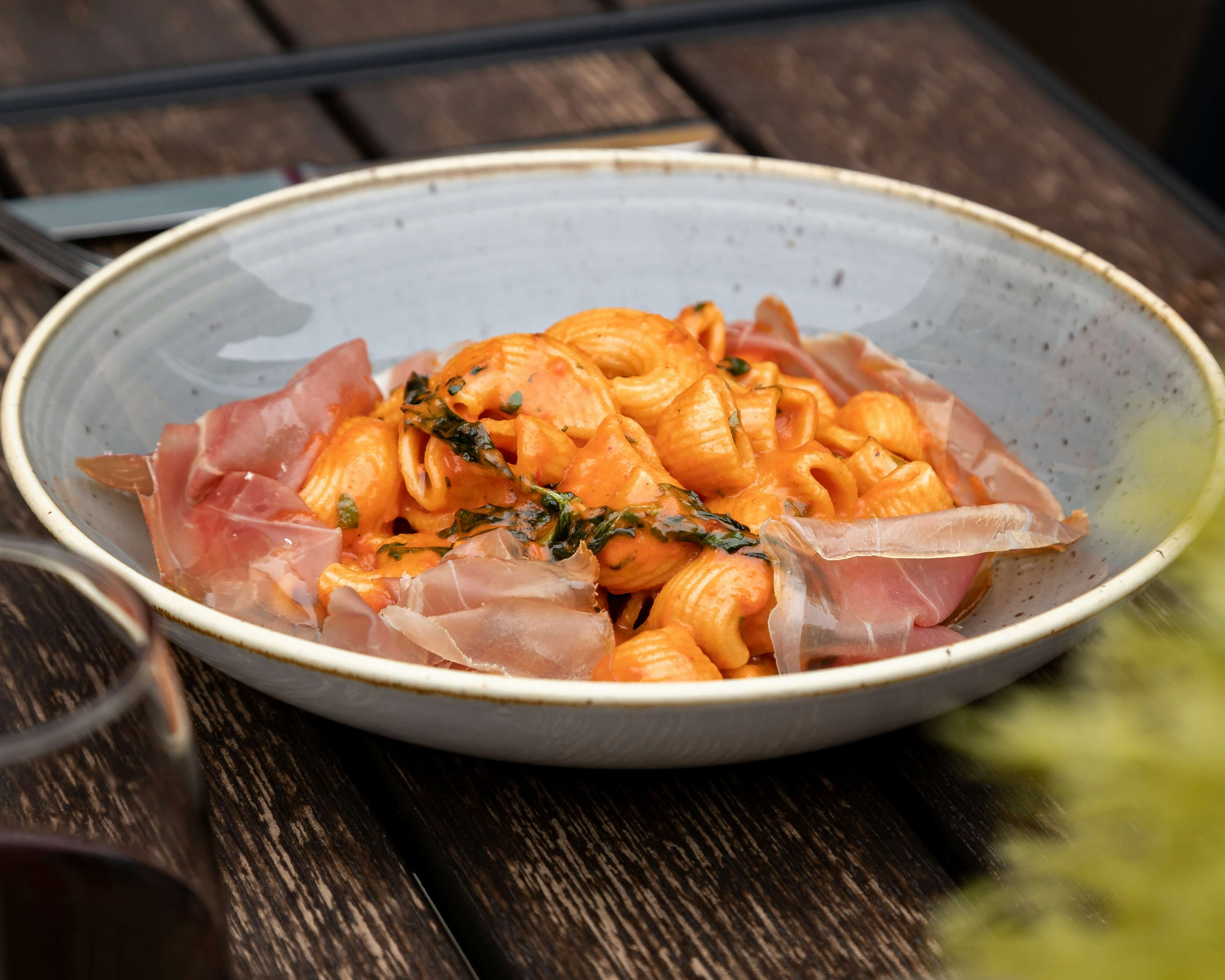 a plate of Italian cuisine on a table in a restaurant